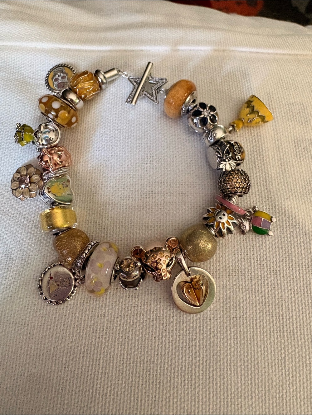 Pandora bracelet with yellow theme charms